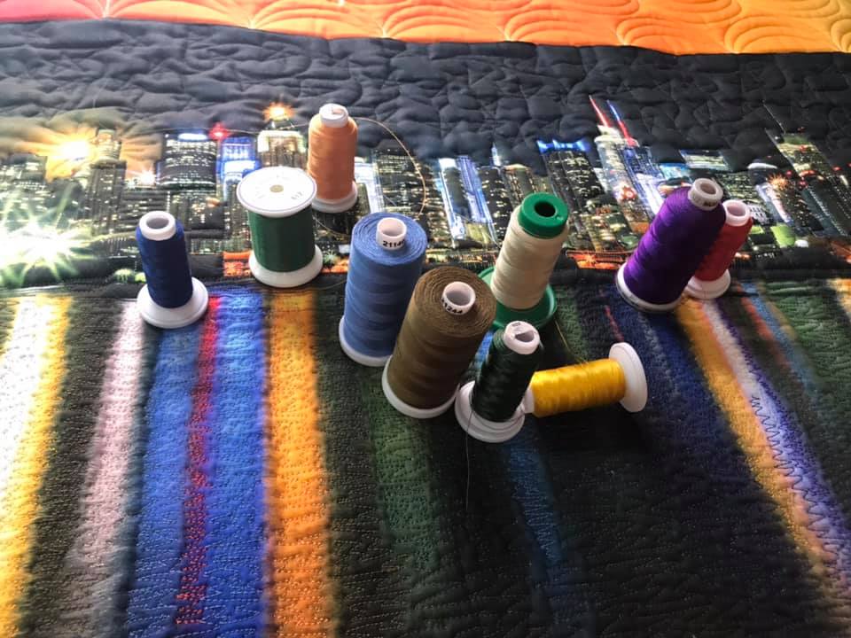multiple colour threads for my NYC skyline wall hanging